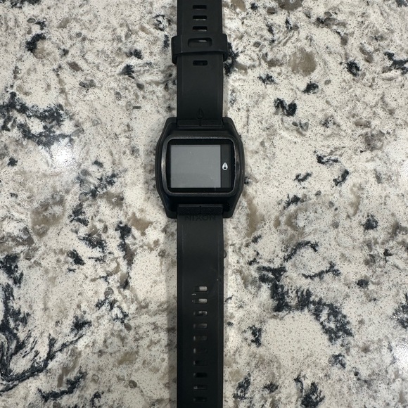 Nixon “ The high tide” watch. Dead battery but watch works perfect.